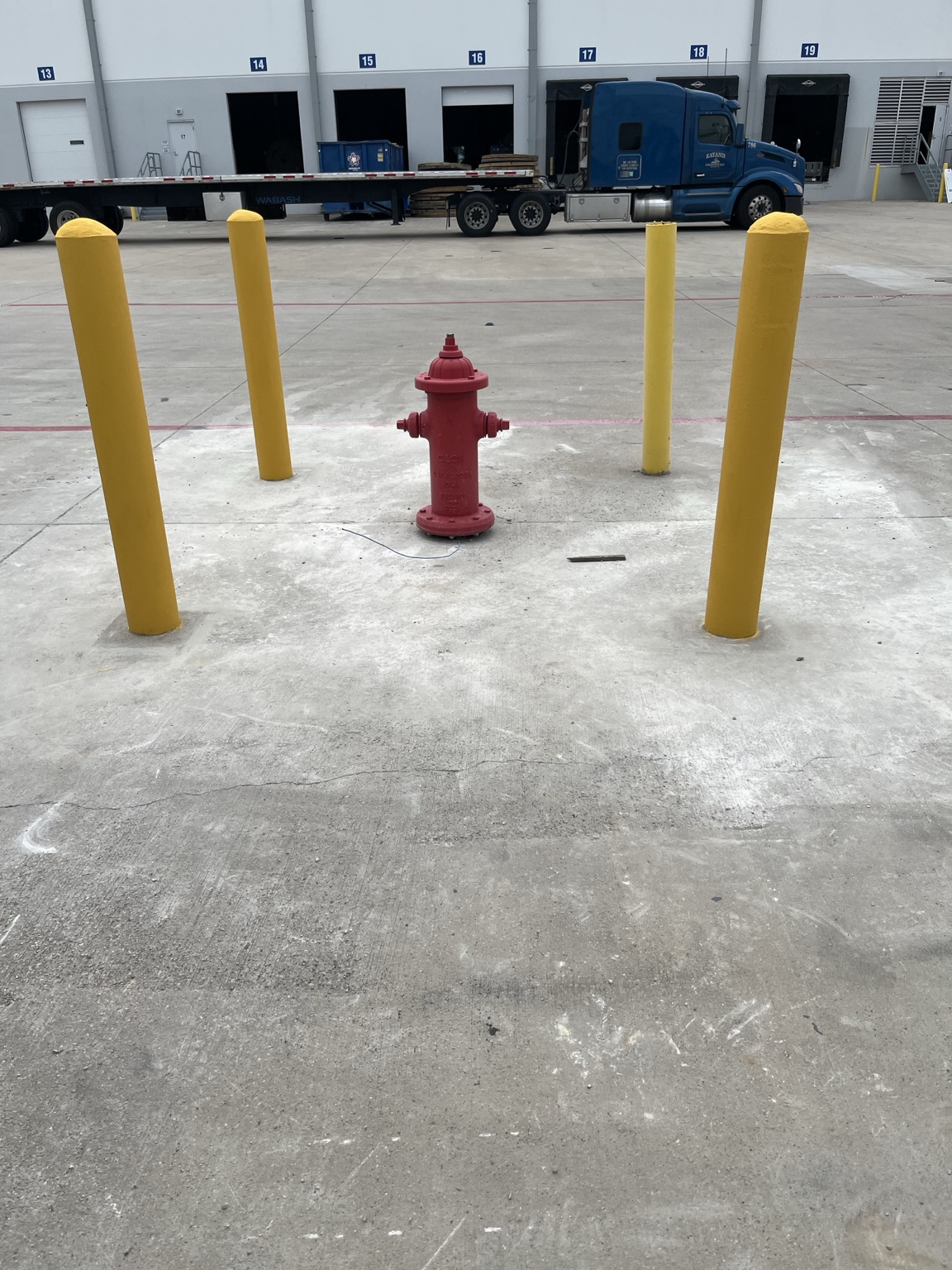 Commercial concrete pavement and safety bollards